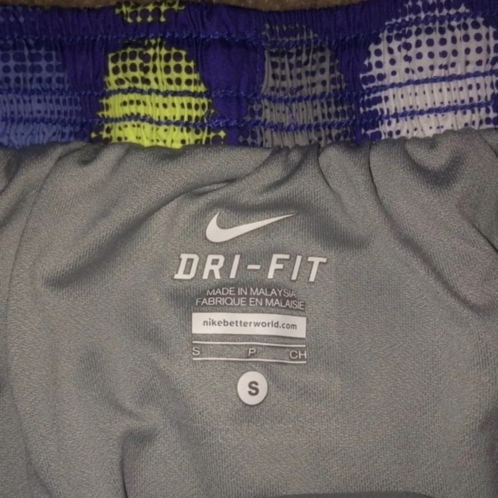 NIKE Dri Fit Tempo purple yellow polka dot Shorts